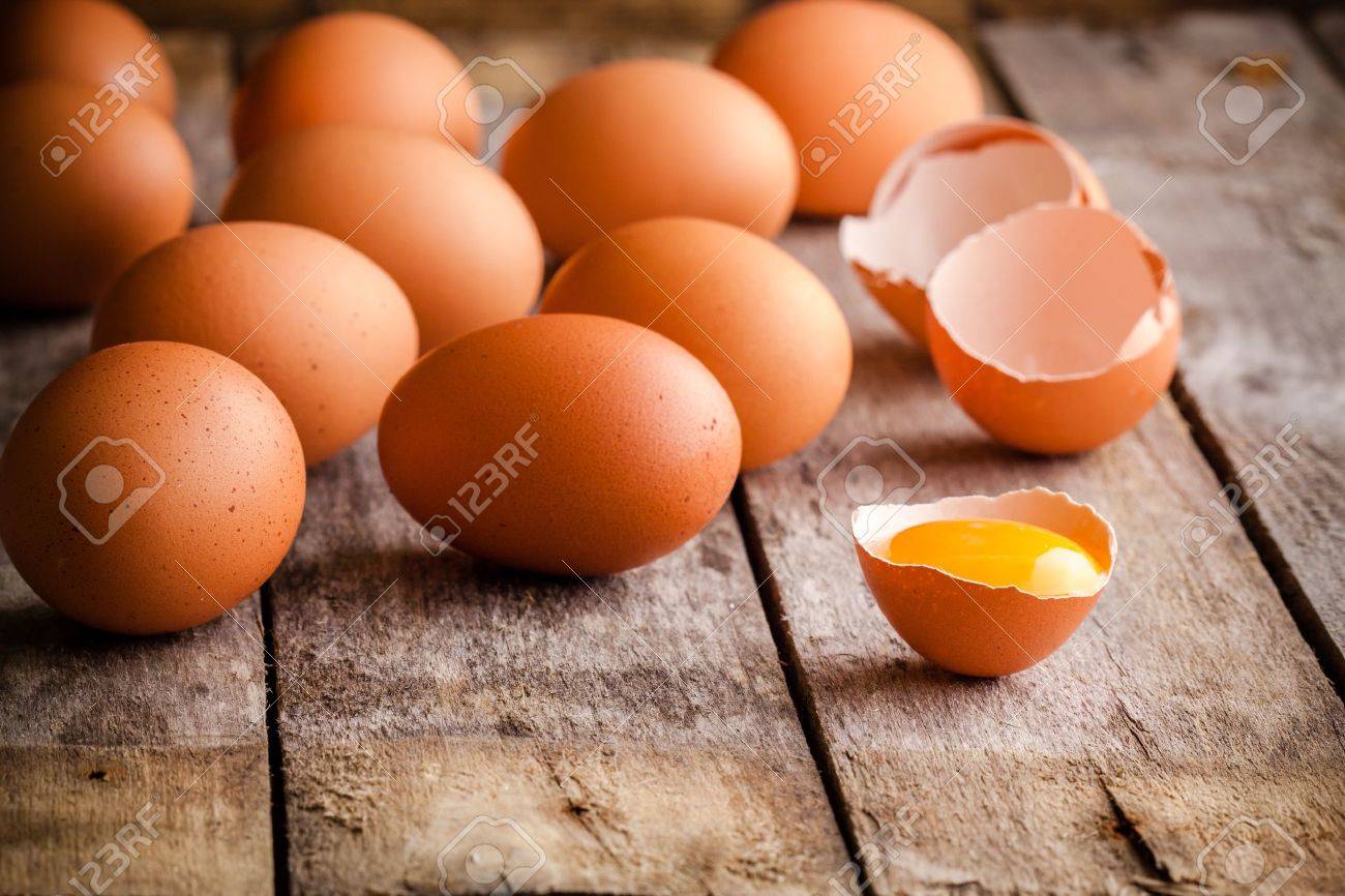 34131527-fresh-farm-eggs-on-a-wooden-rustic-background